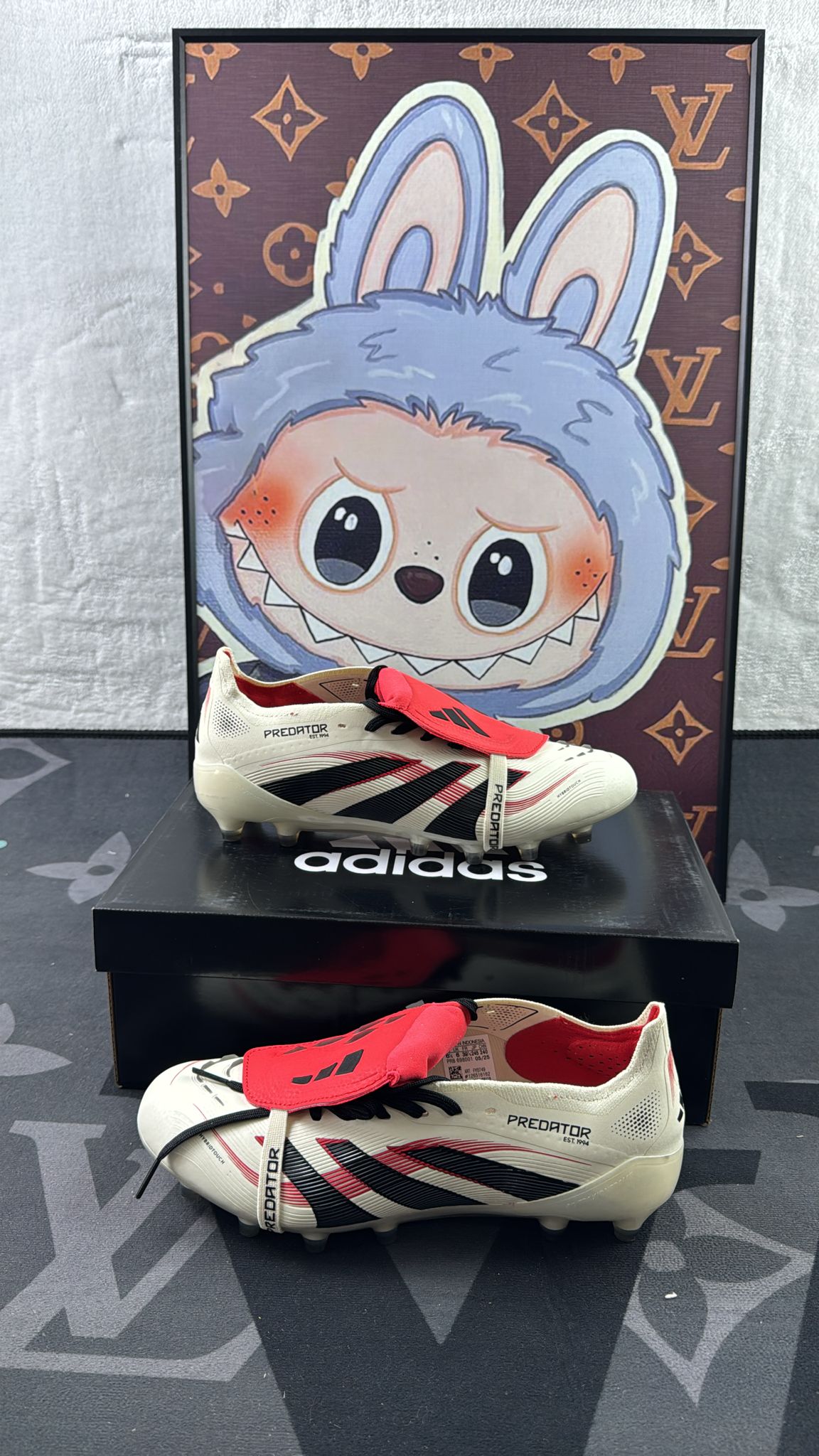 BOTAS DE FUTEBOL COM LÍNGUA DOBRADA PREDATOR ELITE – PISO MOLE